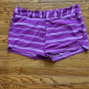 Purple Nike golf shorts